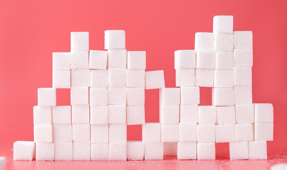 white sugar cube forming lines